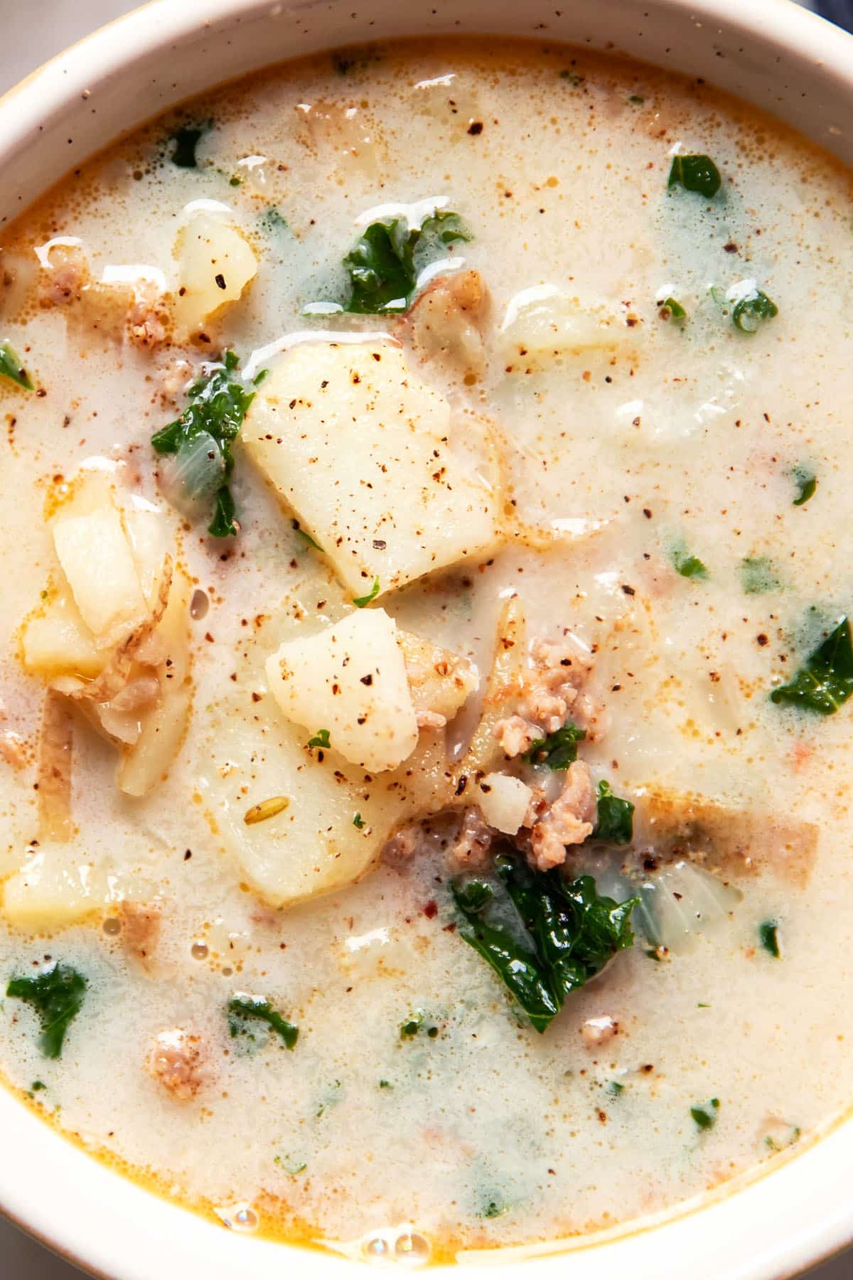 zuppa toscana potato kale soup in a soup bowl close up
