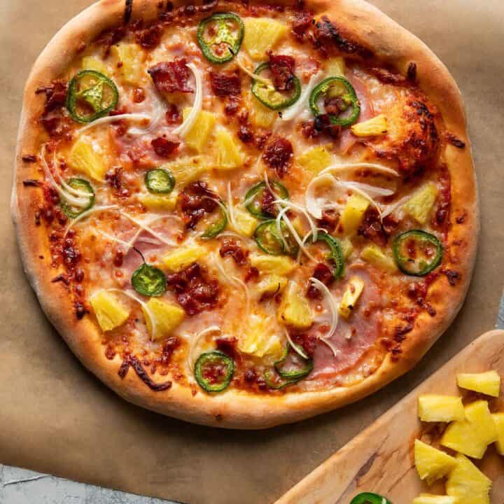 mellow mushroom style pizza with pineapple jalapeno and bacon on top
