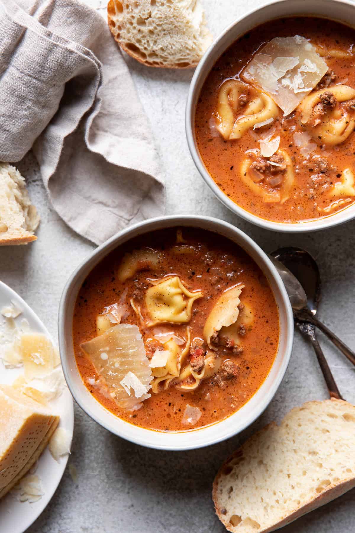 Creamy lasagna tortellini soup in bowls.