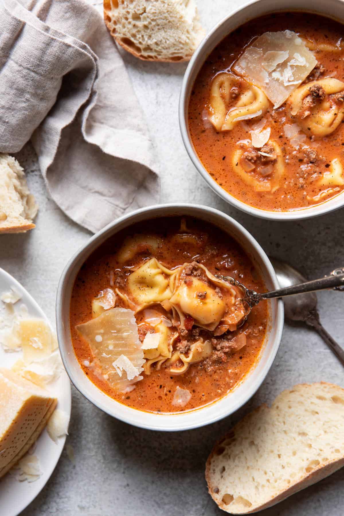 Creamy lasagna tortellini soup in bowls.