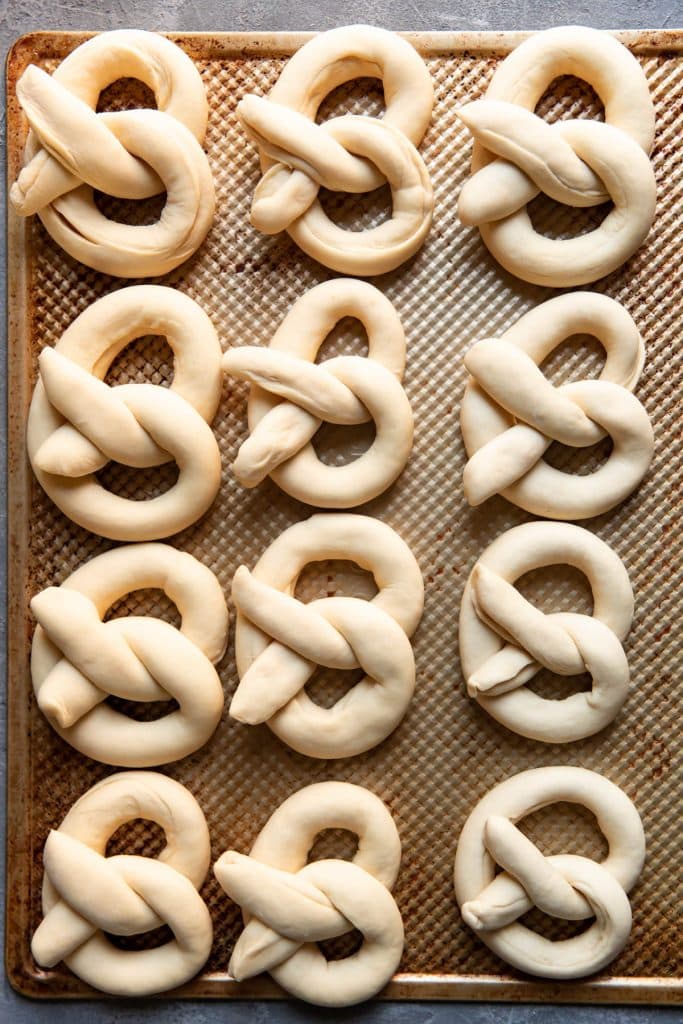 pretzels on a baking sheet before baking