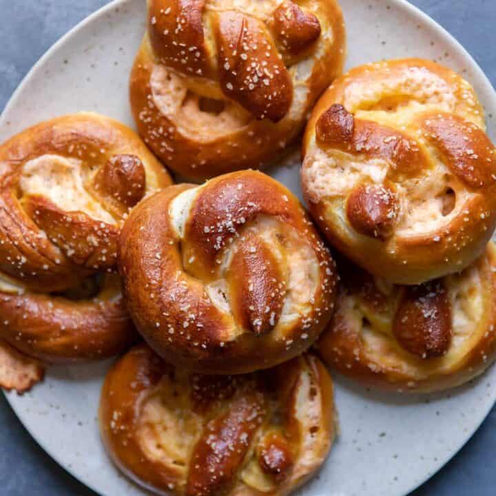 cheese stuffed pretzels on a plate