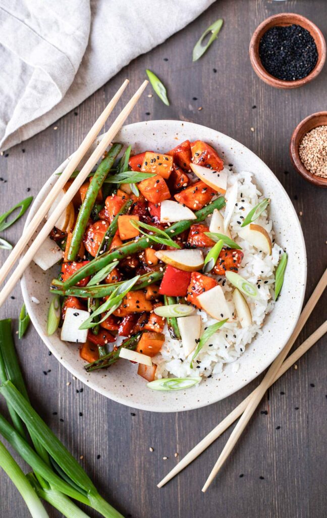 spicy korean chicken and rice in a bowl