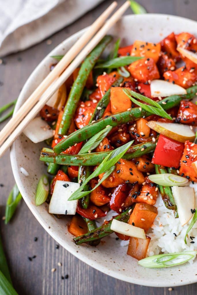 spicy korean chicken and rice in a bowl