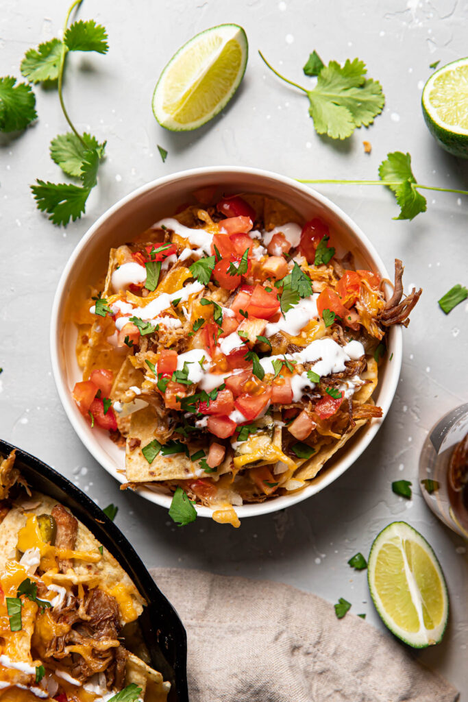 carnitas nachos in a bowl.