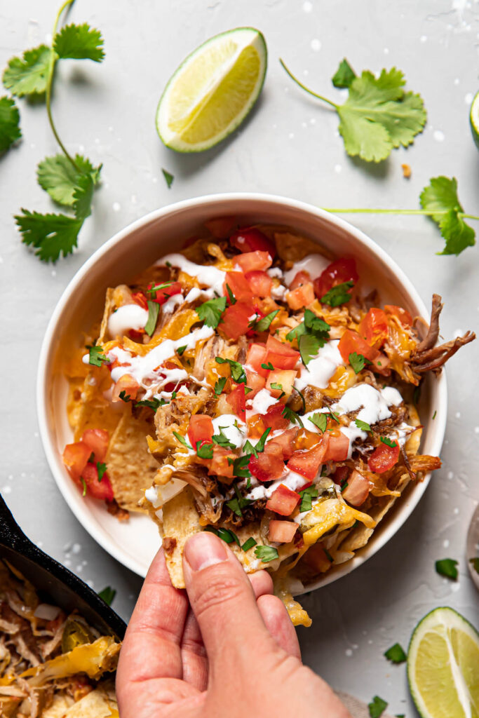 carnitas nachos in a bowl.