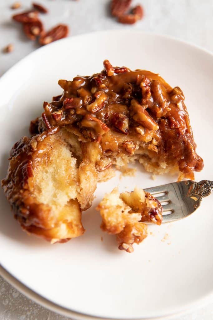 pecan sticky bun on a plate