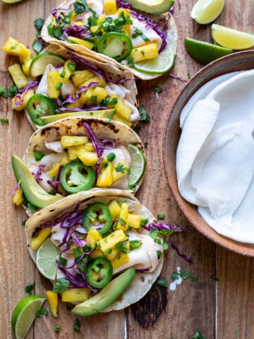 street tacos filled with chili lime coconut meat avocado and pineapple