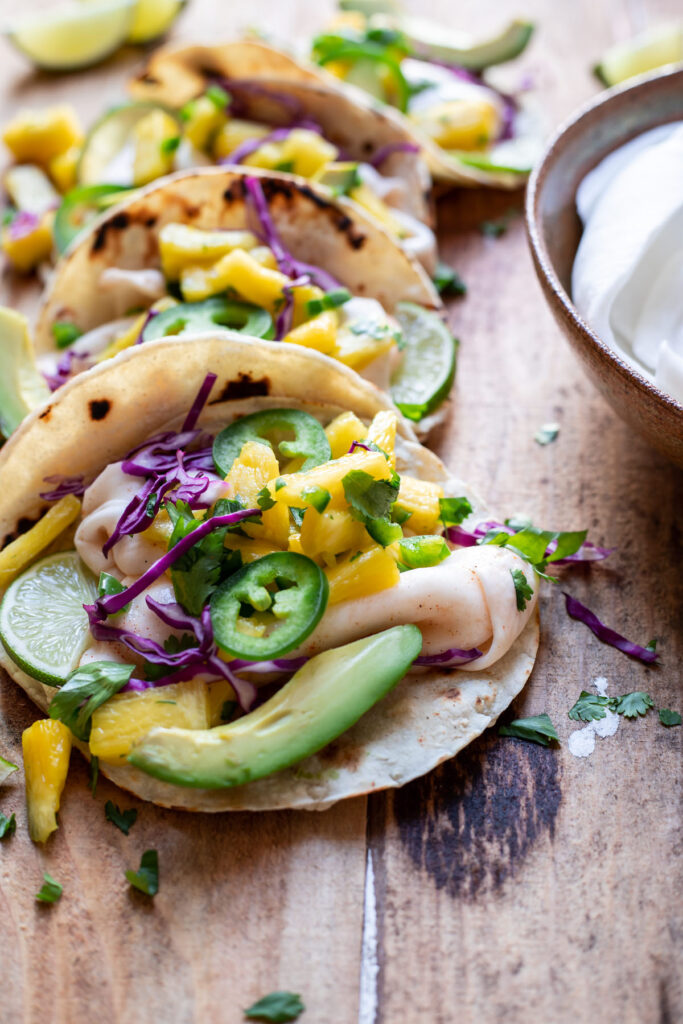 street tacos filled with chili lime coconut meat avocado and pineapple