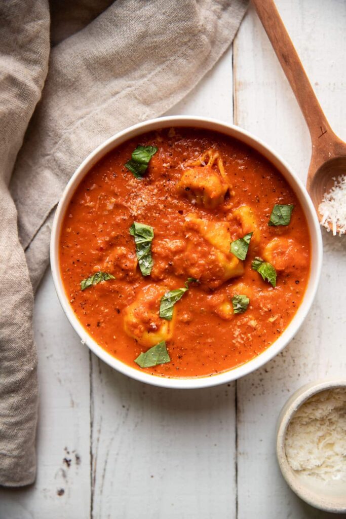 creamy tomato red pepper soup with tortellinis and fresh basil