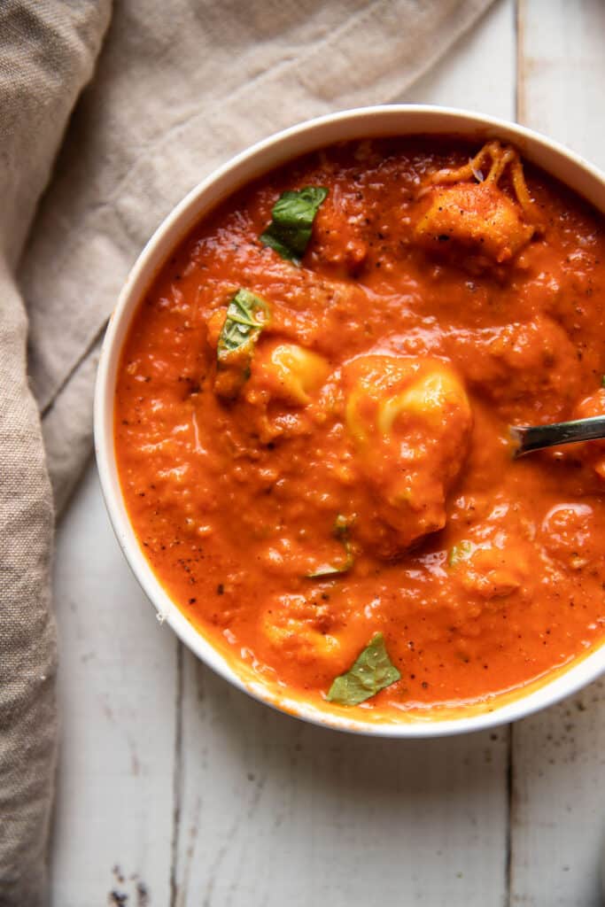 creamy tomato red pepper soup with tortellinis and fresh basil