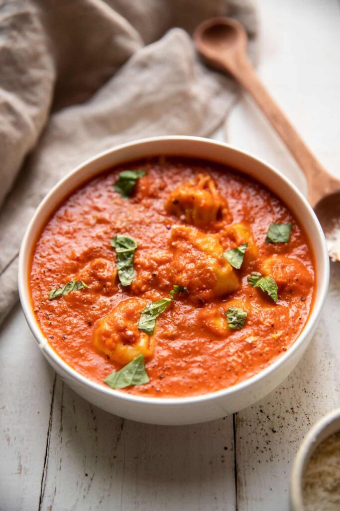 creamy tomato red pepper soup with tortellinis and fresh basil