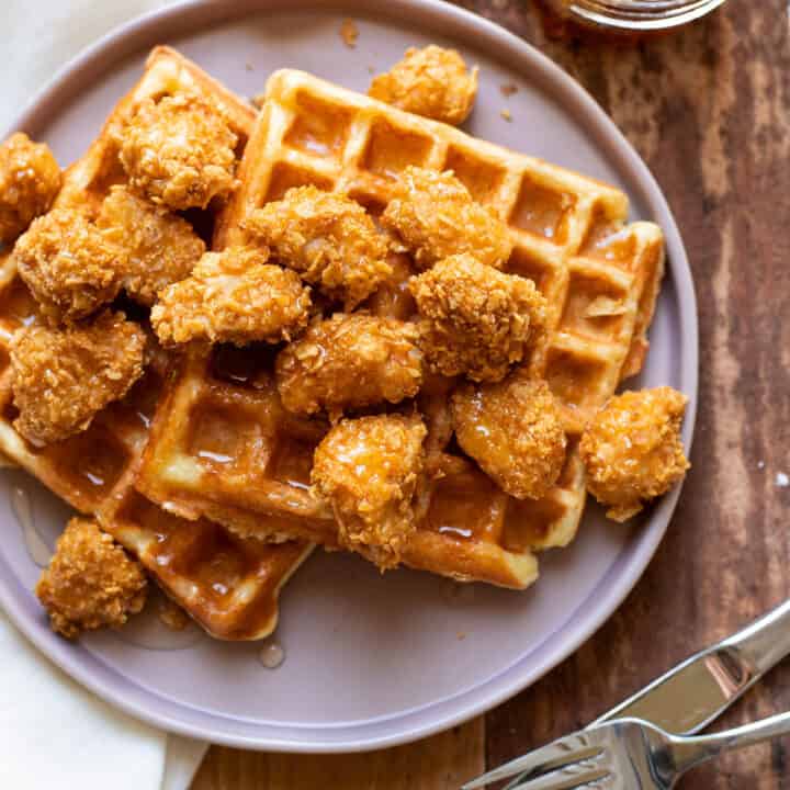 crispy baked chicken nuggets and buttermilk waffles with sriracha honey