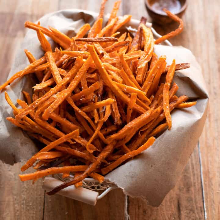 crispy sweet potato fries in a basket