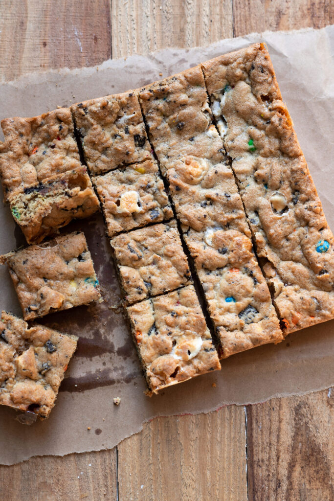 Scrumptious cookie bars filled with marshmallows, oreos and mms