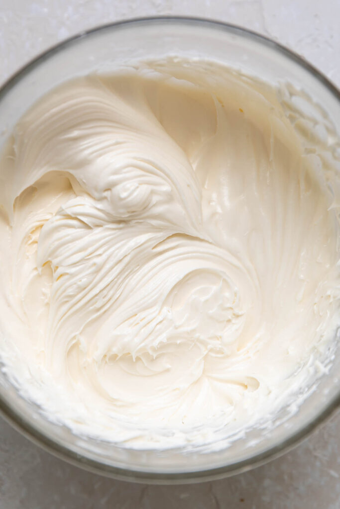 Bowl of cream cheese frosting.