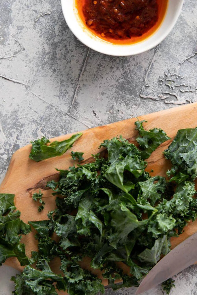 kale on a cutting board.