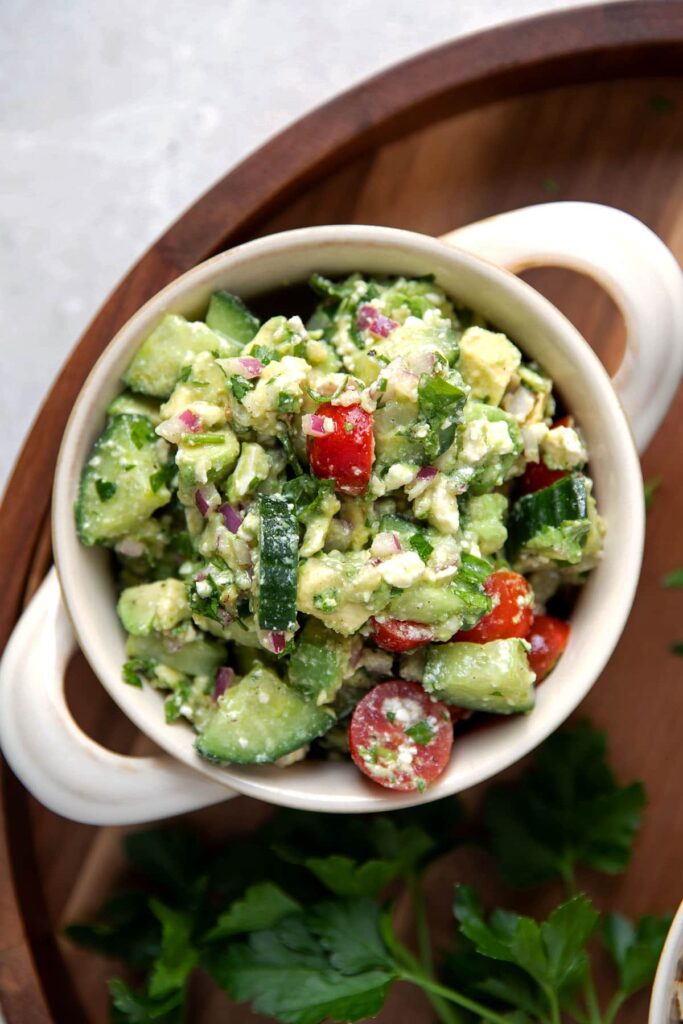 bowl of avocado feta and tomato dip