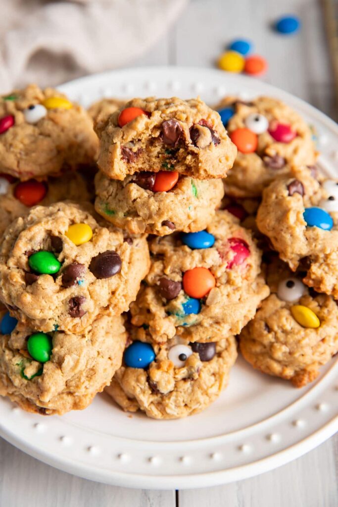 close up of a monster cookie with a bite taken out of it