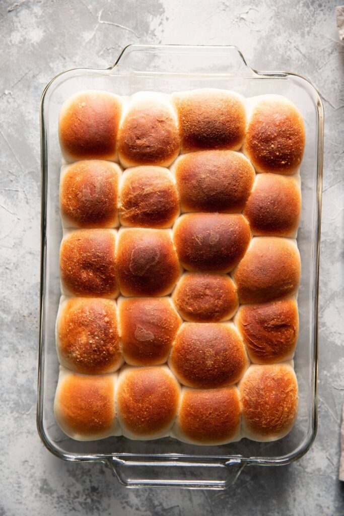 baked rhodes rolls in a baking glass dish