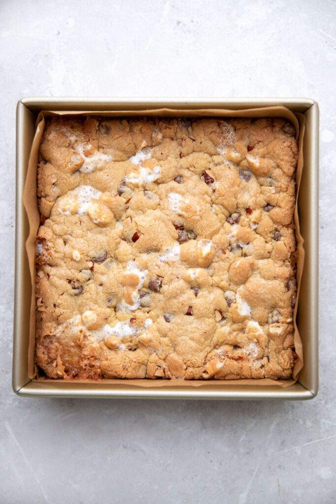 brownie pan full of cooked rocky road cookie dough