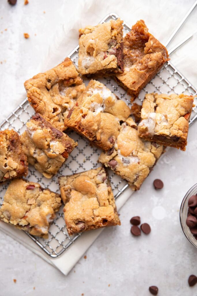 rocky road cookie bars arranged on a silver cooling rack