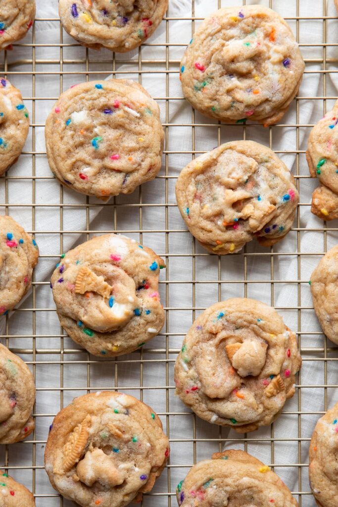 baked sprinkle cookies on a cooling rack