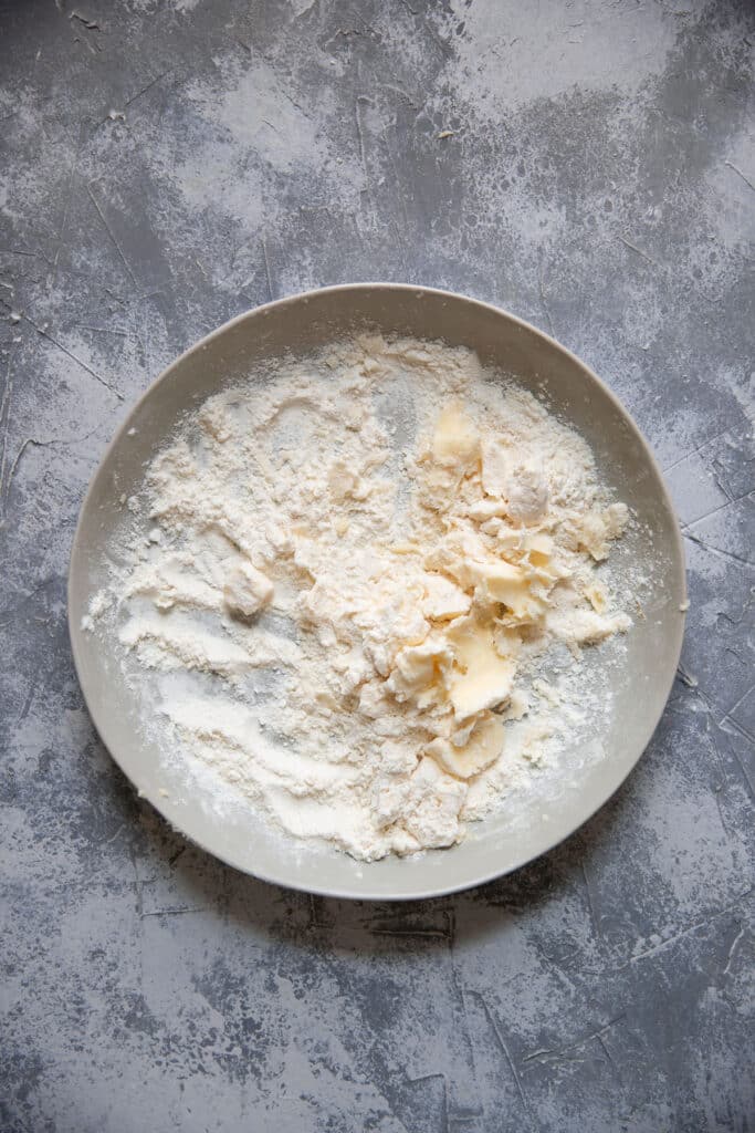 butter and flour crumbled together on a plate