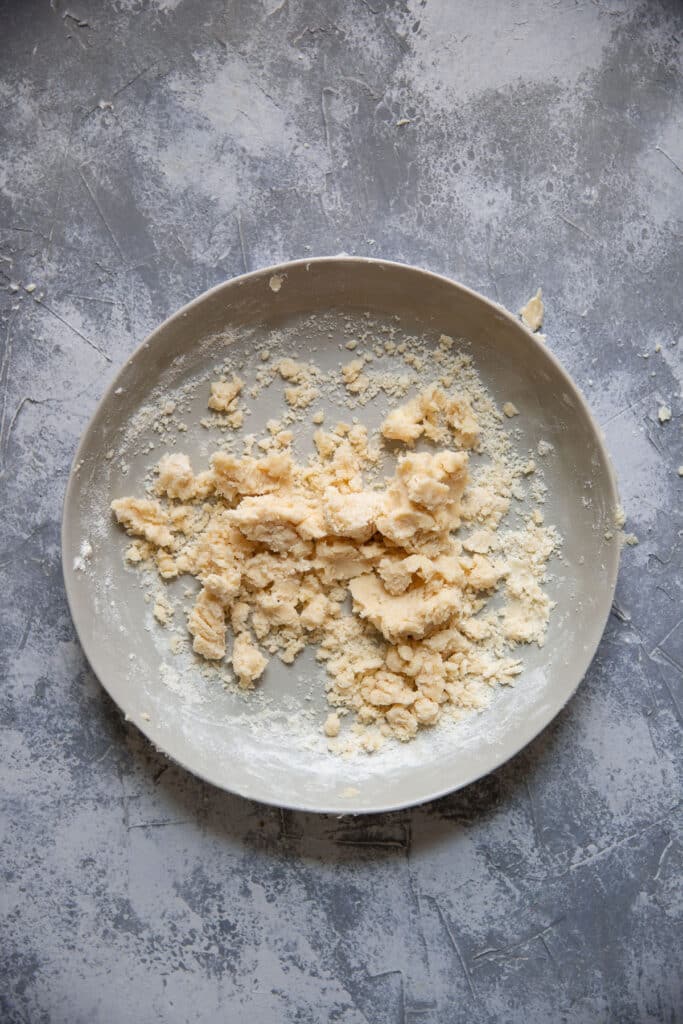 butter and flour crumbled together on a plate
