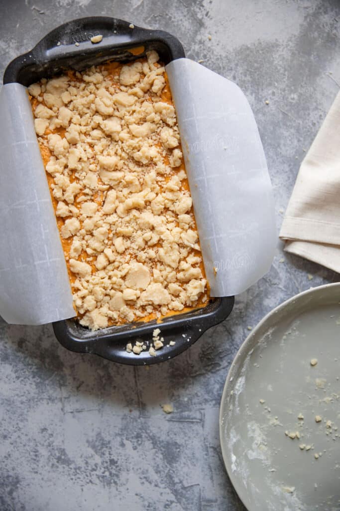 pumpkin batter in a loaf pan prior to baking