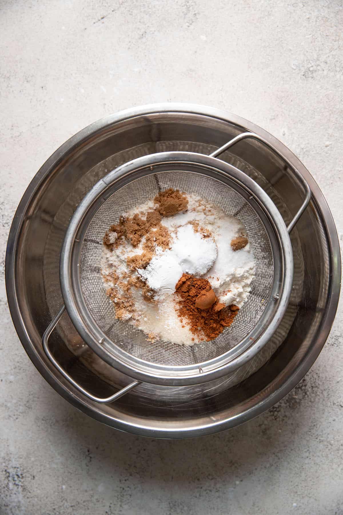 baking ingredients in a sifter