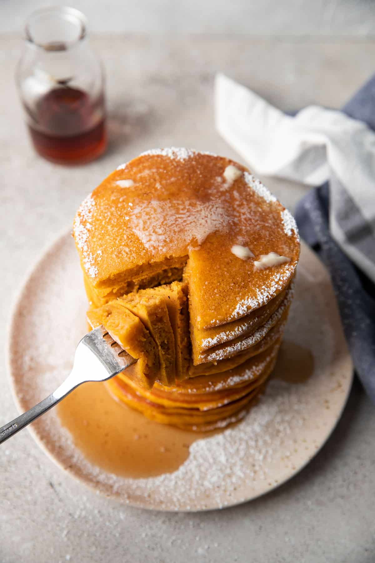 fork grabbing some pancakes