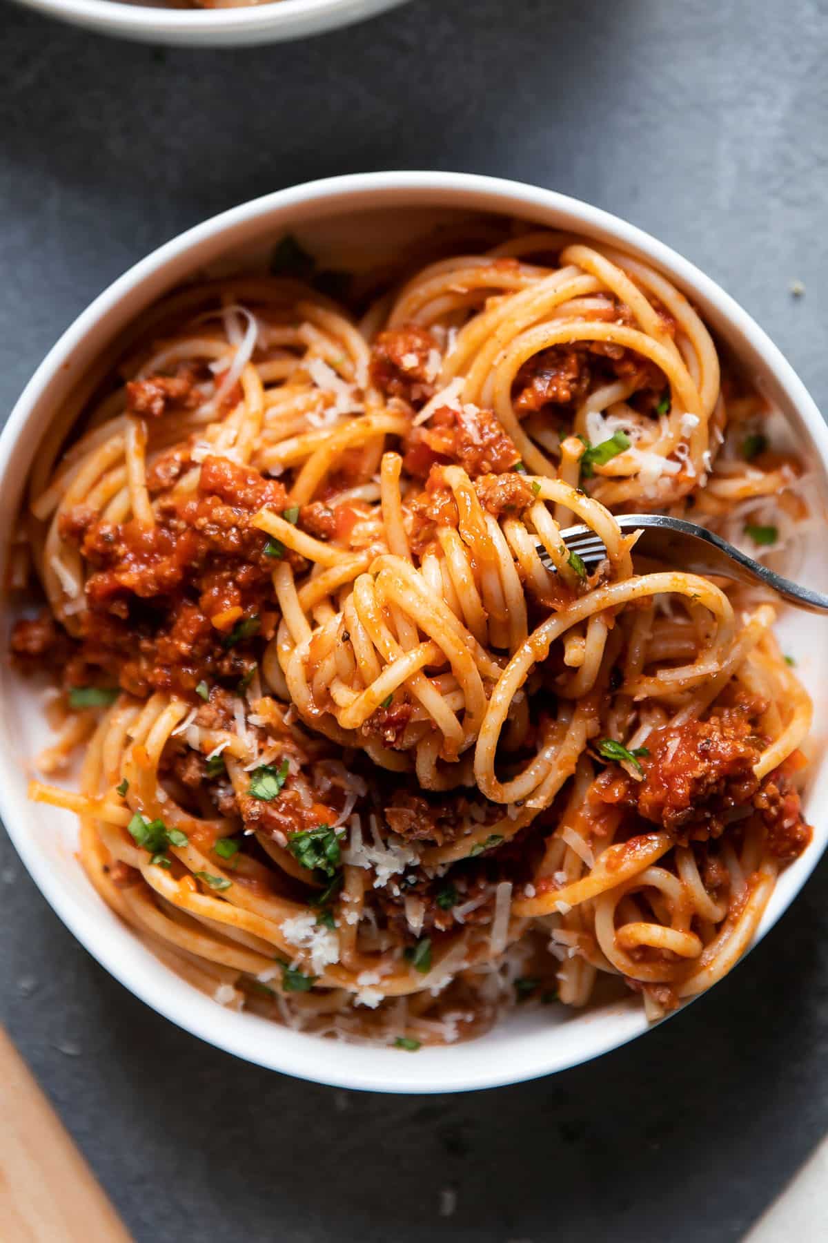 pasta in a bowl with meat sauce