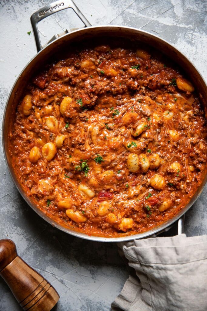 gnocchi marinara and ground beef in a pan