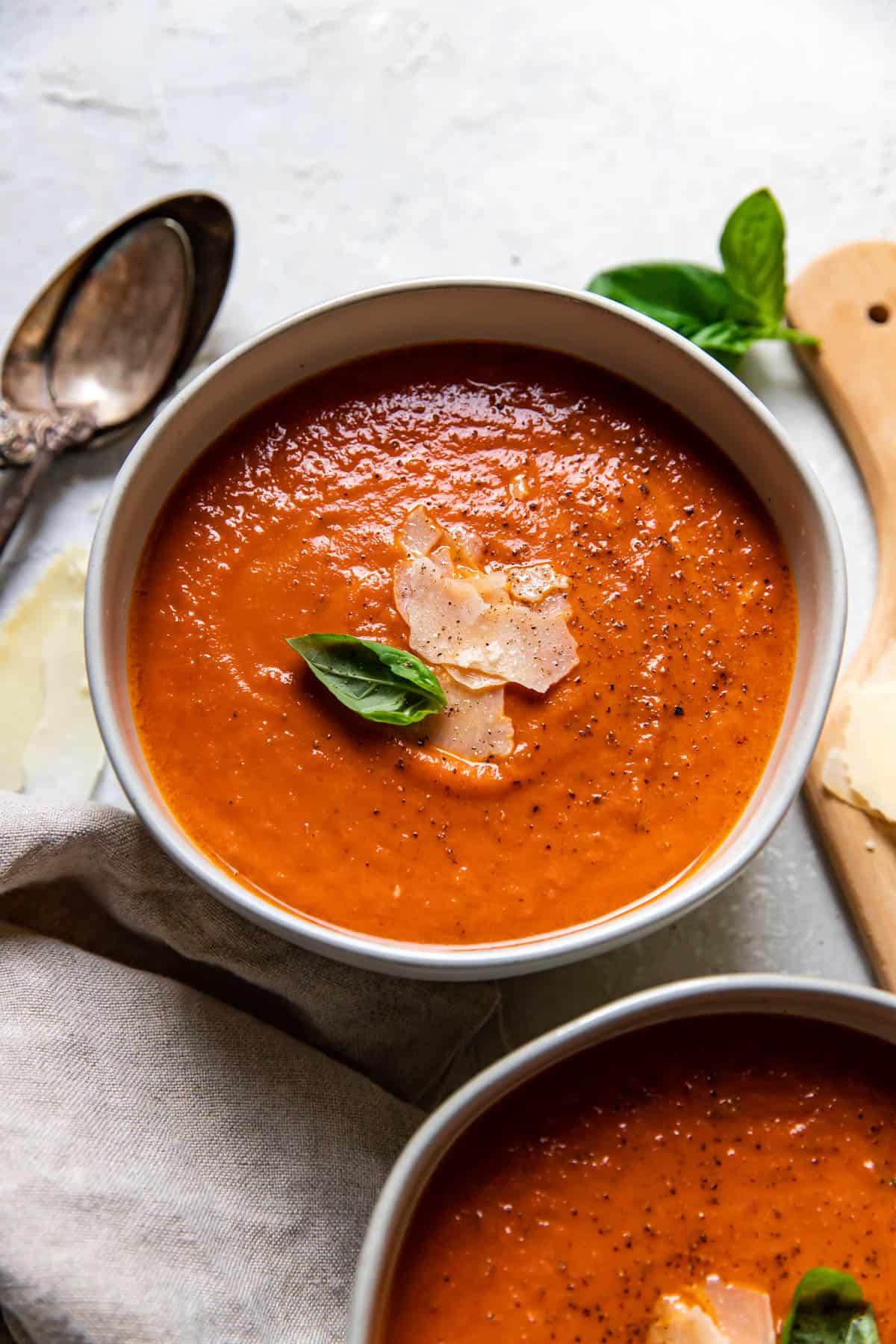 tomato basil soup in bowls.