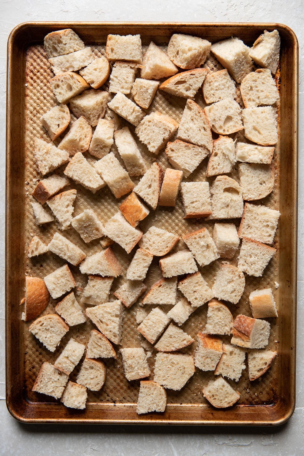cubes of bread on a pan