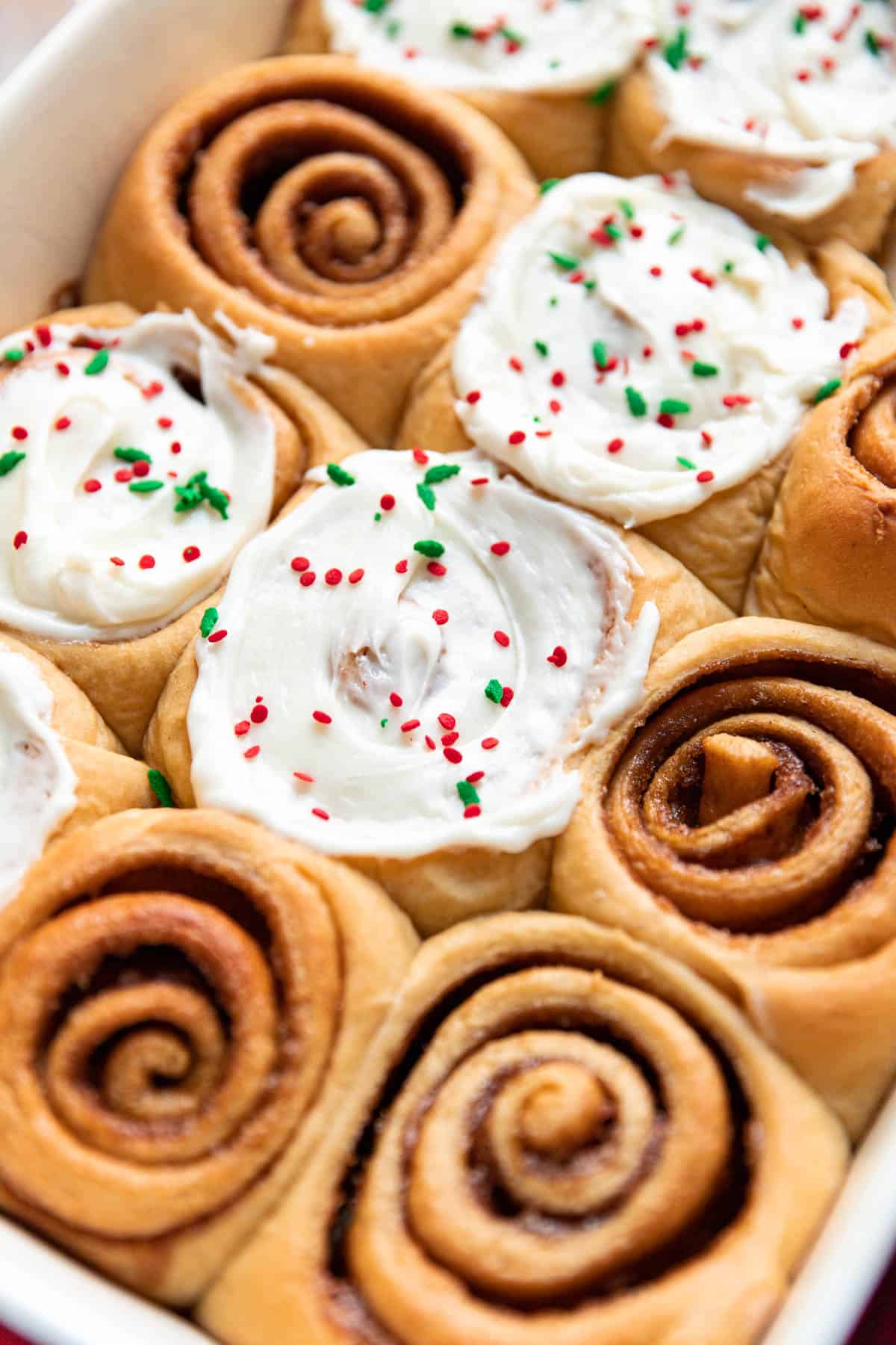 gingerbread cinnamon rolls in a baking dish.