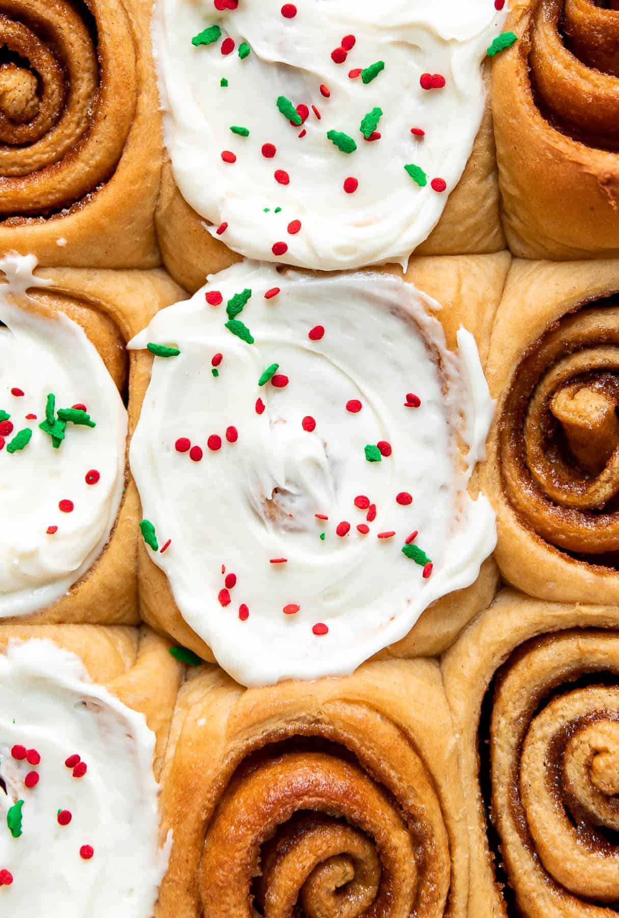 gingerbread cinnamon rolls in a baking dish.