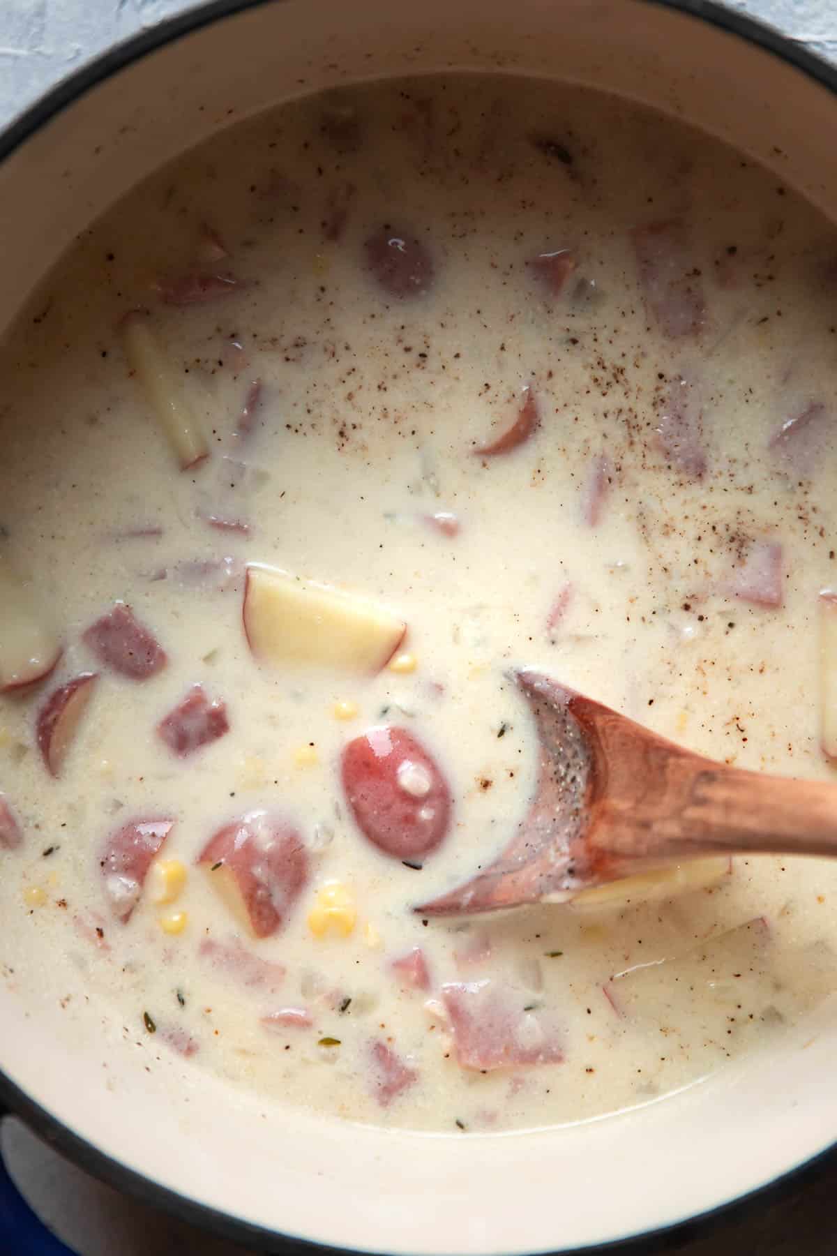 ham potato corn soup in a soup pot