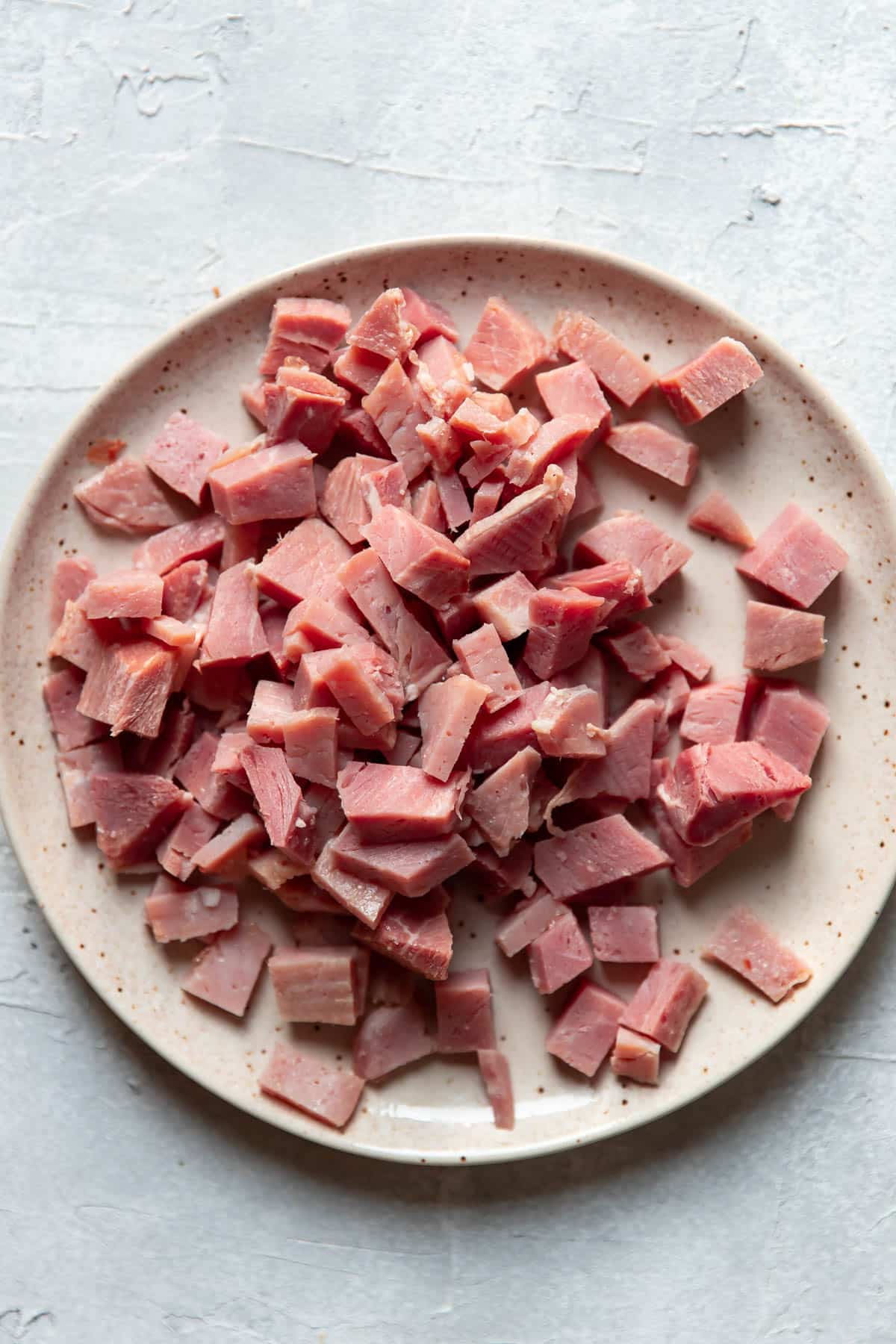 cut up ham on a plate