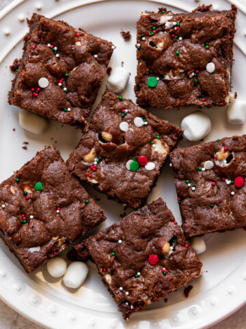 hot cocoa cookie bars on a plate.