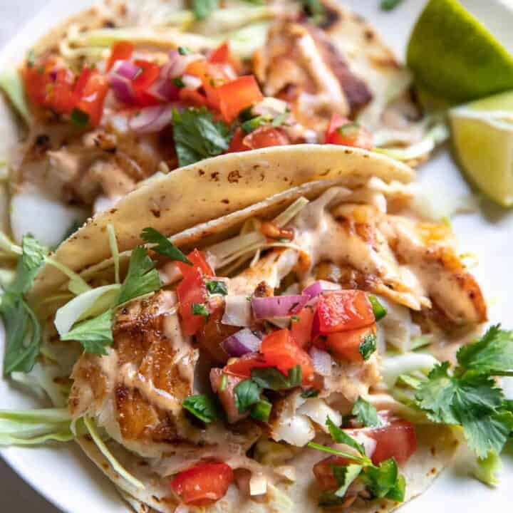 Fish tacos on a plate.