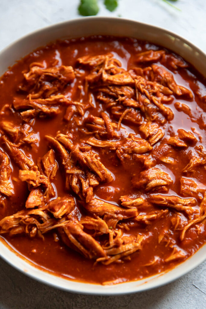 Shredded chicken in tinga sauce.