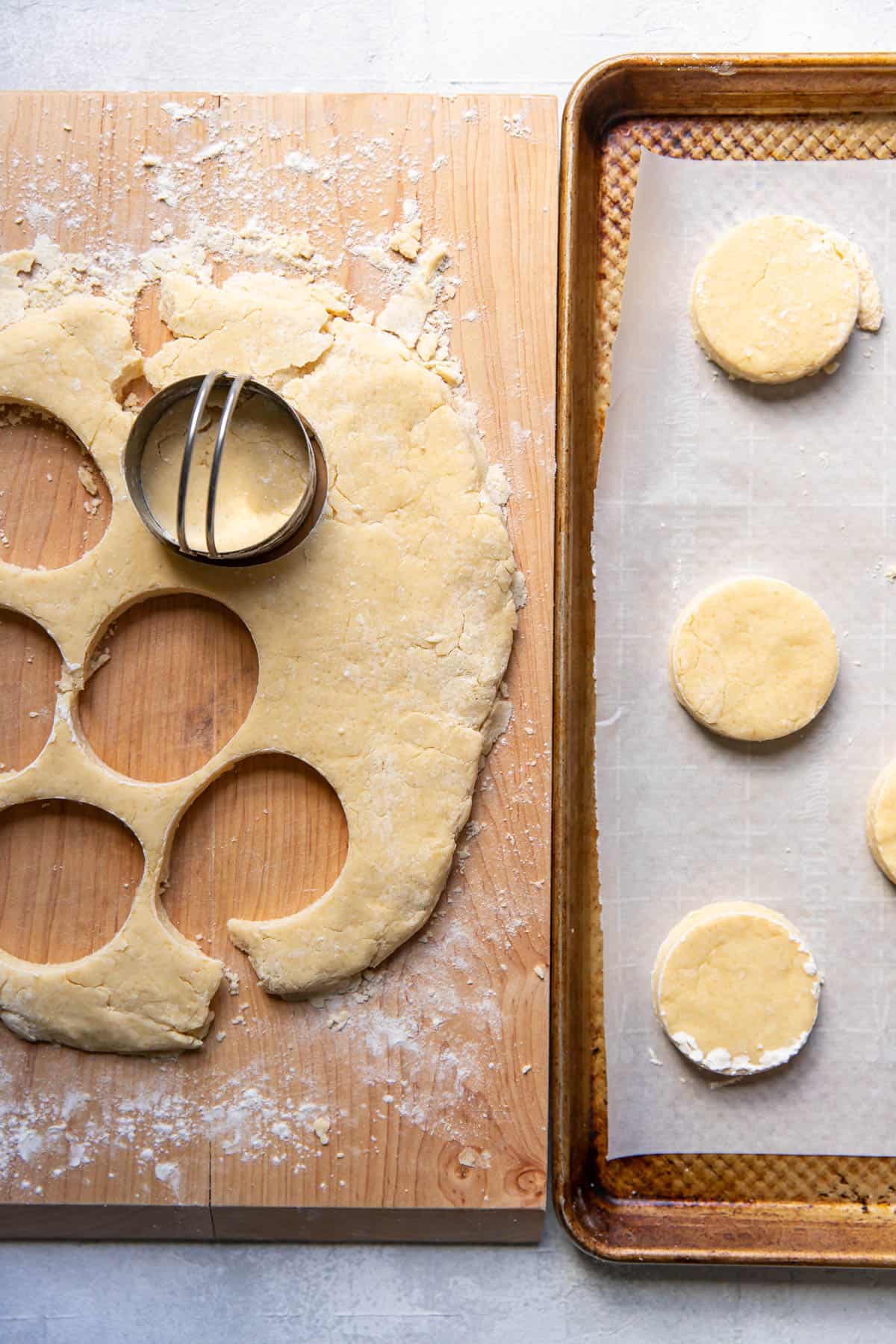 Irish scones being cut out with a biscuit cutter.