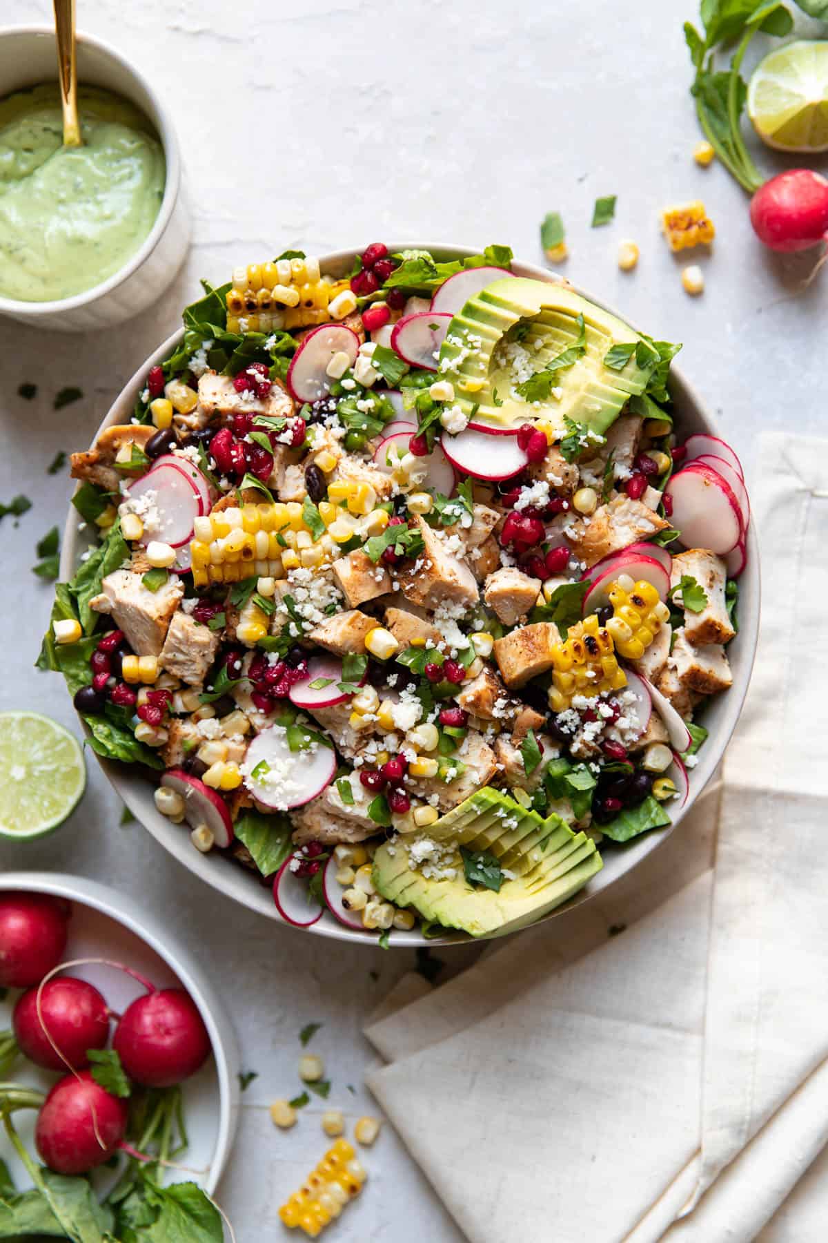 https://moderncrumb.com/wp-content/uploads/2021/04/chicken-avocado-pomegranate-salad-3.jpg