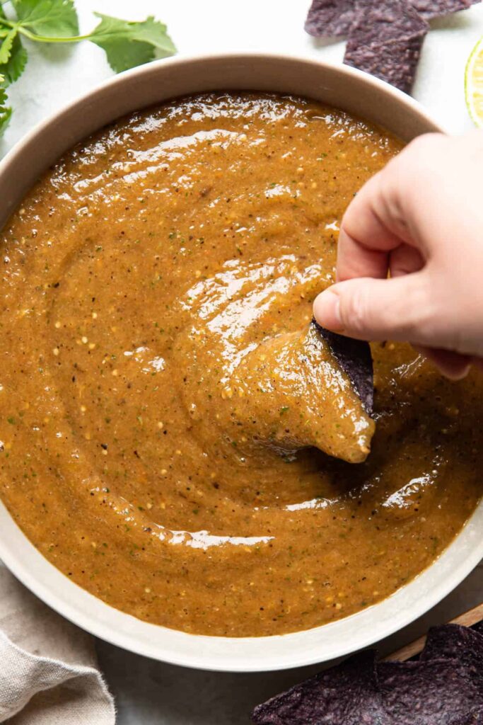 roasted tomatillo salsa in a bowl.