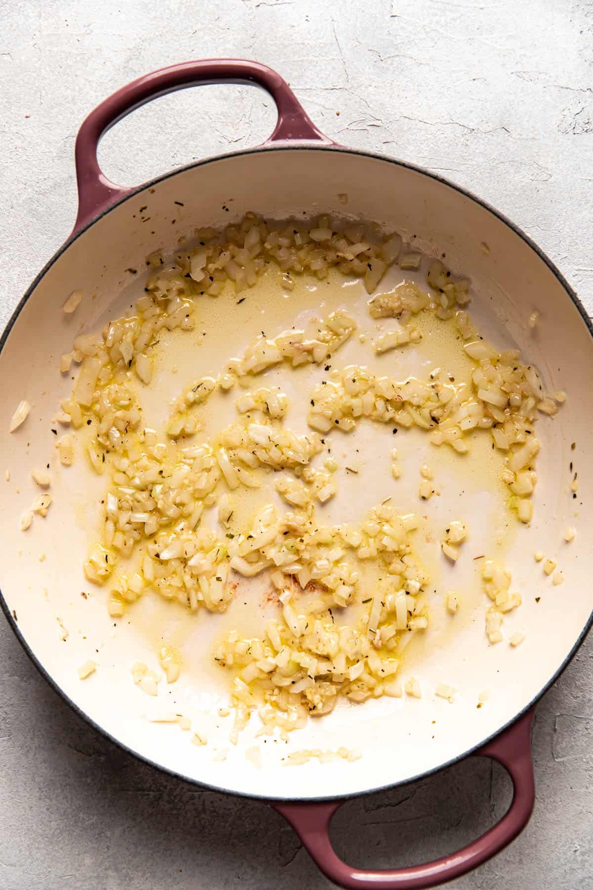 sauteed onions in a pan.