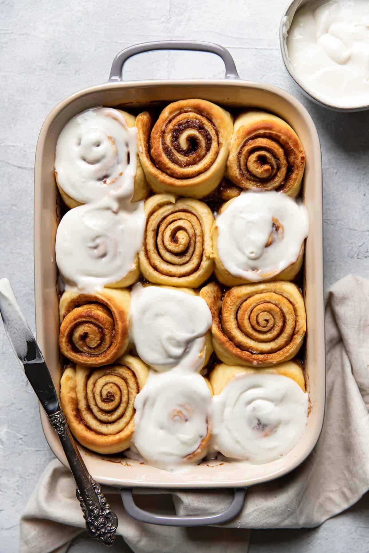 overnight cinnamon rolls in a baking dish.