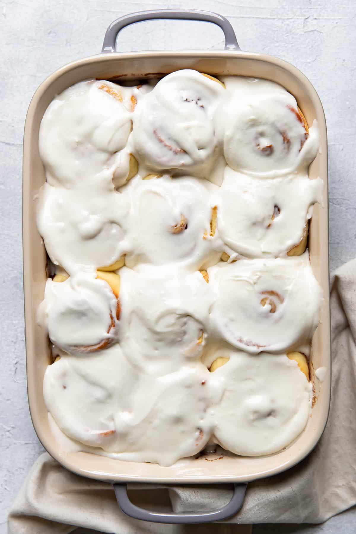 overnight cinnamon rolls in a baking dish.