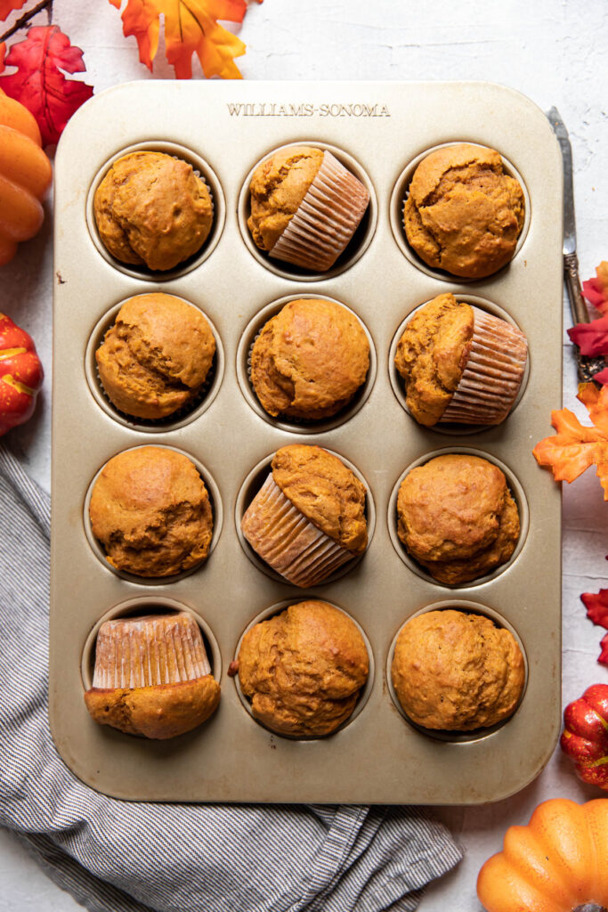pumpkin muffins in a muffin tin.